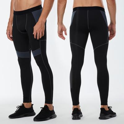 China Breathable Man Running Sports Fitness Sports Pants Gyms Eco Leggings Training Yoga Tight Pants for sale