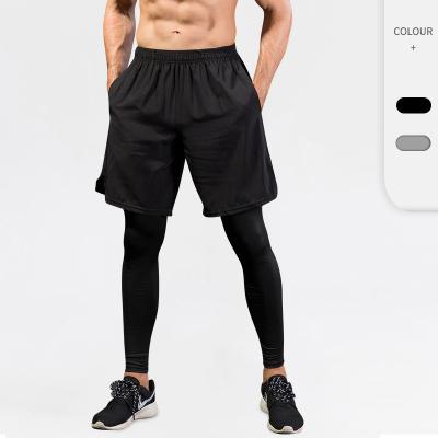 China Breathable low price rigged 2 piece fitness running breather workout gym leggings shorts for men for sale