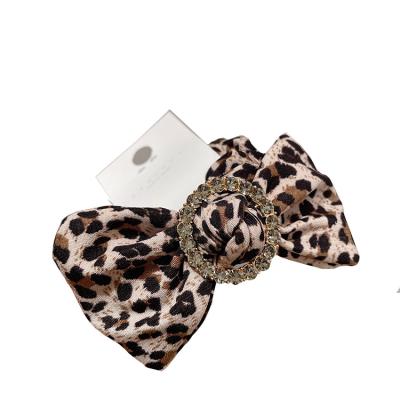 China 2021 latest fashion brown hair bow leopard rhinestone hair bow for sale