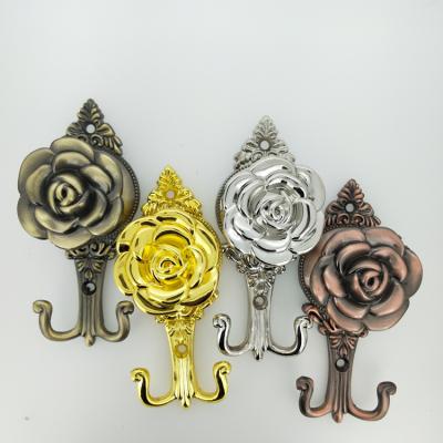 China Metal Flowers Hang Curtain Accessories Iron Curtain Hooks for sale