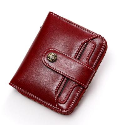 China Fashion Ladies Short Mini Wallet Oil Wax Genuine Leather Wallet Women for sale