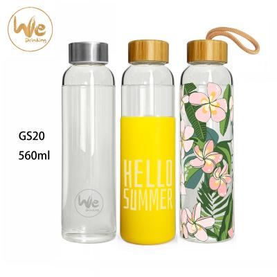 China Viable Single Wall Glass Water Bottle Bamboo Lid with Silicone Sleeve for Detox Hot or Cold Tea for sale