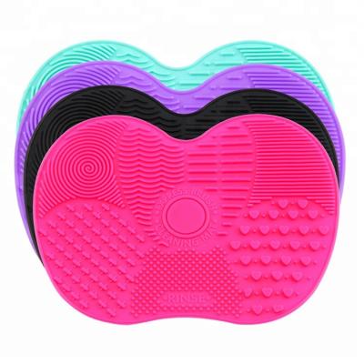 China Newest Cheap Eco-friendly Silicone Wash Scrubber Apple Shape Mat Makeup Brush Pad Brush Cleaning Mat for sale