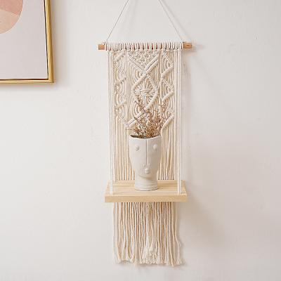 China Bravo Traditional Bohemian Style Handmade Macrame Wall Hanging Plant Shelf Woven Home Decor for sale