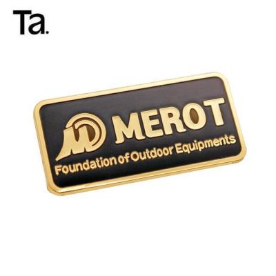 China TANAI Eco-friendly Luxury Gold Custom Die Cast Metal Epoxy Logo Plate Metal Labels For Handbags for sale