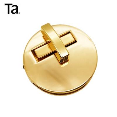 China TANAI Eco-friendly Wholesale Metal Twist Locks Custom Design Press Handbag Lock Hardware For Bags for sale