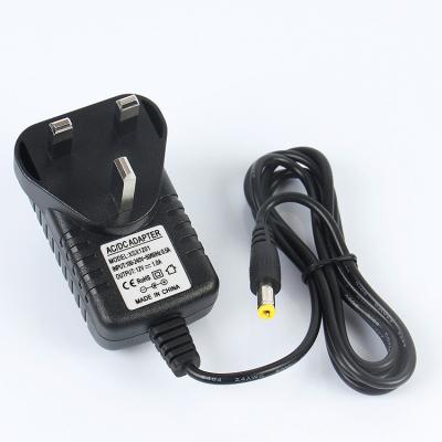 China British Currency UK Regulations Plug In 12V1A Power Adapter 12VDC Switching Power Supply for sale