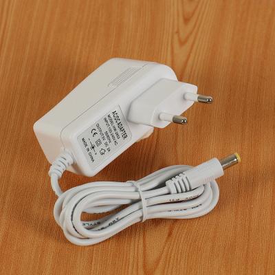 China Currency 12V1A Wall AC/DC 12V Adapter EU Switching White Adapter For Set Top Box 12V 1A White 12w Adapter for sale