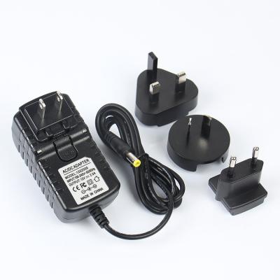 China Interchangeable Currency Socket AC DC Power Adapter 5V3A 9V2.5A 12V2A 24V1A UK AU UK Plug Travel Switching Interchangeable Adapter for sale