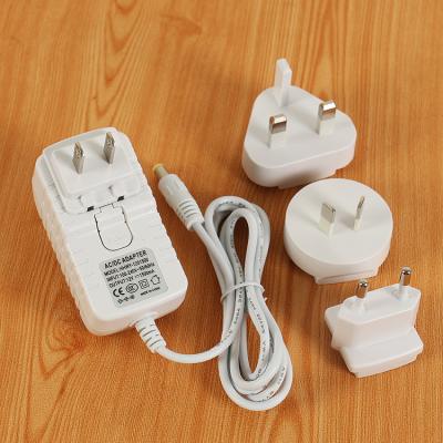 China Currency 12V2A Power Adapter 12V3A Wall Plug Power Adapter 5V 6V 9V 12V 15V 24V 48V 1A 2A 2.5A 3A White Interchangeable AC to DC Power Supply for sale