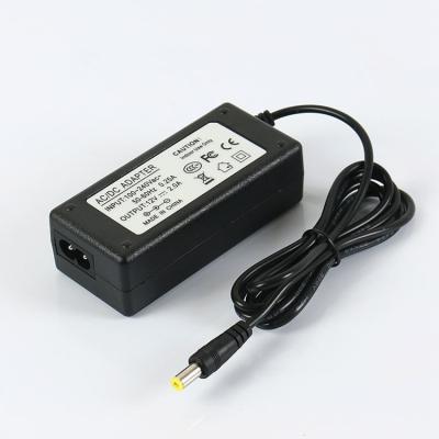 China Currency 24W Output Power Switching Power Supply With 12V2A AC/DC Adapter for sale