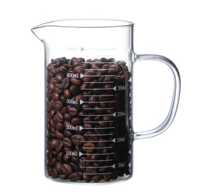 China Stocked Glass Measuring Beaker with Handle - 1000ML/33oz Glass Beaker Mug with Measuring for Milk, Juice, Beer, Coffee for sale