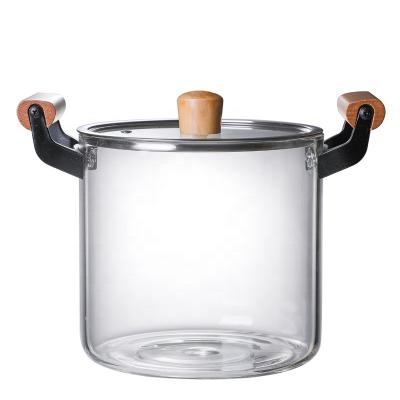 China Custom Viable Pyrex Glass Soup Pot Heat Resistant Clear High Borosilicate Glass Cooking Pot Set Clear Glass Cookware Pot Big Size With Wooden Handle for sale