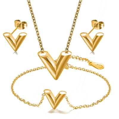 China Wholesale 18k Luxury Environmental Friendly Gold Letter Earring Bracelet Silver Plated V Shaped Necklace Set Woman Stainless Steel Jewelry For Ladies for sale