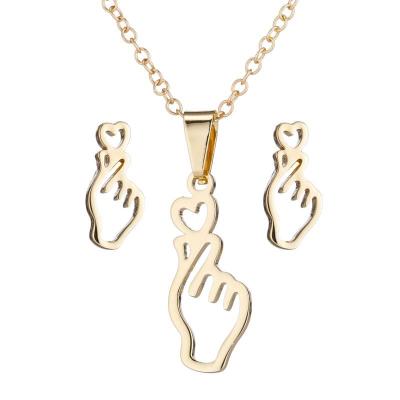 China Environmental Friendly New Arrive Charm Finger Heart Pendant Women Girls Stainless Steel Silver Gold Plated Earring Necklace Jewelry Set For Ladies for sale