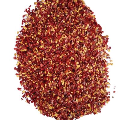 China Dried red chili flakes with yellow seeds used for pizza for sale