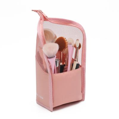 China Travel Small Transparent Toiletry Bag Pouch Stand-Up Cosmetic Brush Organizer OEM Cosmetic Brush Holder for sale