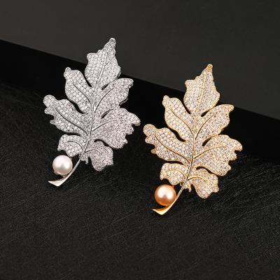 China Fashionable high quality jewelry women cc brooch leaf brooch pins rhinestone crystal big brooches women for sale