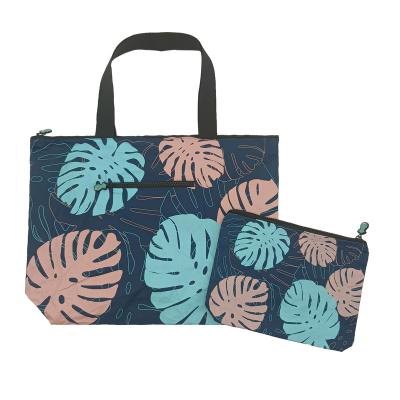 China Latest New Design Handled Top Longevity Green/Pink Material Monster Pattern Navy Blue Color Large Tote Medium Pouch 2pieces for sale