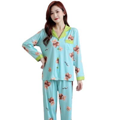 China QUICK DRY long sleeved women's pajamas spring and winter pants lapels cartoon printed milk silk leisure women's home clothes for sale