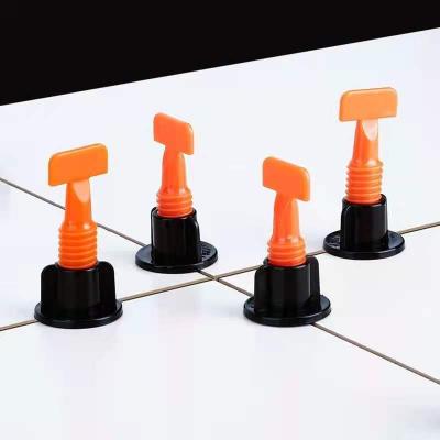 China Modern Accessories Good Quality Ceramic Tile Leveling System Clip and Wedges Spacers T-Shape Tile Leveling System Fixing Clamp for sale