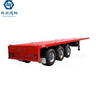 China Flatbed Trailer 3 Axle 4 Axle 40T 60T Flatbed Semi Trailer For Crane Excavator Container Shipping for sale