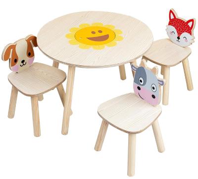 China Custom Solid wood Kids round Table Desk With 3 Animal Chairs wooden storage table for kids learning 62*62*10cm for sale