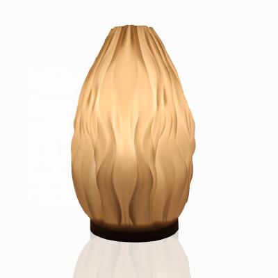 China Modern Minimalist Bedroom Modern Headbed Lamp Home Decorative Lava Shaped LED Table Lamp for sale