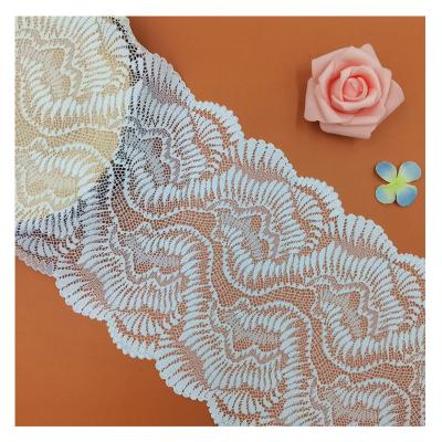 China Elastic Women Lace Swiss African Lace Trim Fabric Elastic 3d Flower Stretch Lace for sale