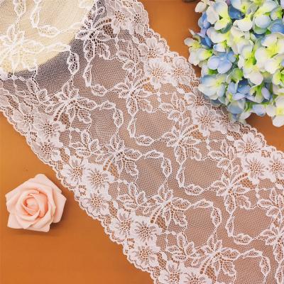 China Elastic Nylon Elastic Workmanship New Design And Spandex Lace Trim Stretch White Floral Knitting Lace Trim for sale