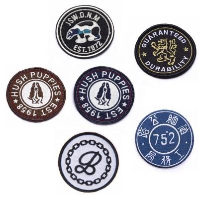 China Wholesale 3D Circular Iron-On Custom Colorful Brand Logo Merrow Border Machine Woven Small Patches For Hats Bags Pantone Shoes OEM for sale