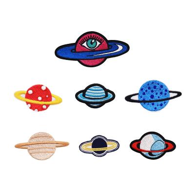 China Beautiful planet clothing decor handmade cheap diy bag soft PVC shirt 3d iron on tablet sets embroidery self-adhesive patches for sale