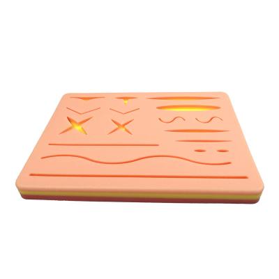 China Durable and Tear Resistant Medical Faculty Use Suture High Quality Durable Skin Surgical Suturing Pad with Precut Skin Suture Simulation Skin for sale