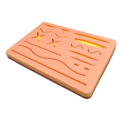 China Durable And Tear Resistant Supplier Of Silicone Wrapped Suture Pad Human Traumatic Skin Model Suturing Training Pad For Doctor Nurse Student Practice Model for sale