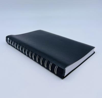 China Spiral Plastic Black Cover Embossed Twin Spiral Binding Pattern Notebook for sale