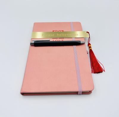 China Promotional Embossing Leather Hardcover PU A5 Cover Notebook Engraves Custom Logo Notebook With Elastic Band and Pen Holder for sale