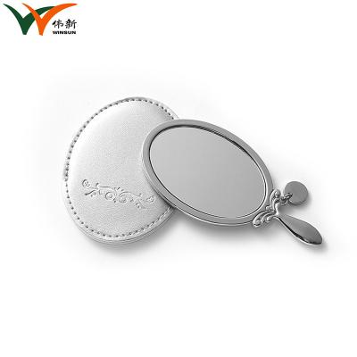 China Custom personalized oval pocket handheld makeup mirror for sale for sale