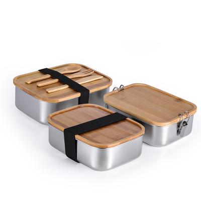 China Freshness Preservation Stainless Steel Lunch Box Tiffin Box Food Container Three Compartments School Lunch Box With Bamboo Lid And Tableware Set for sale