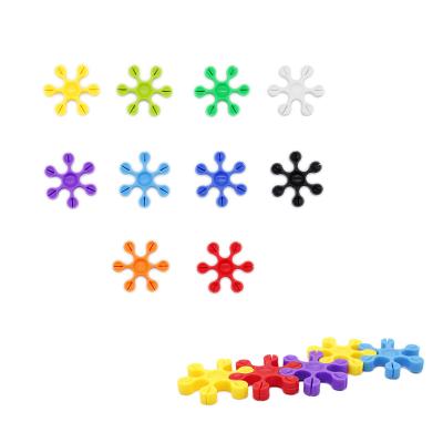 China Hot Selling Exercising Brain Shaping Connecting DIY Snowflake Bricks Kindergarten Building Blocks Kid Preschool Educational Toy for sale