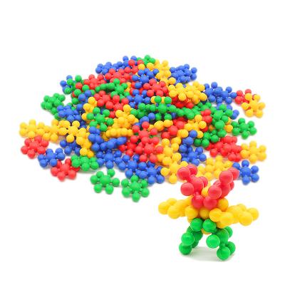 China The Teaching Round Snowflake Building Block Toy Plastic Connecting Educational Toys with100 Piece Plastic Interlocking Discs for sale