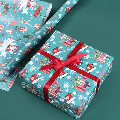 China Recycled Materials Wholesale Santa Claus Elk Christmas Gift Box Wrapping Paper Cartoon Wrapping Paper For Gift Shop for sale