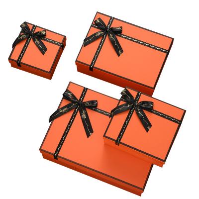 China Recycled Materials Ribbon Lipstick Perfume Box Vintage Wedding Favor Embossed Orange Gift Box For Celebrate for sale