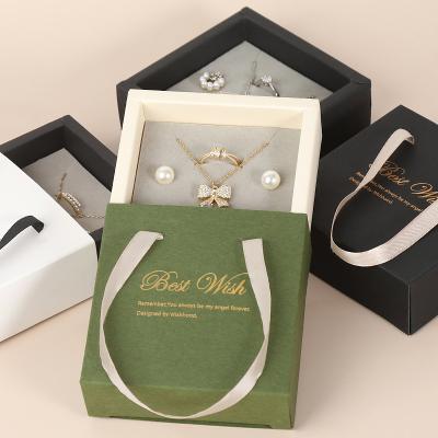 China 2022 Fashion Handmade Gift Box Drawer Necklace Portable Earring Ring Display Jewelry Storage Box With Ribbon for sale