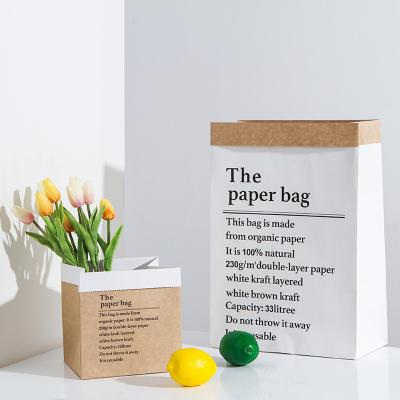 China Custom Wholesale Biodegradable White Square Flower Dry Portable Kraft Paper Bag Wedding Gift Bag For Florist for sale