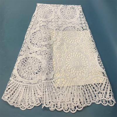 China Pure white wedding dress sequins new French elegant bridal lace fabric high quality water soluble dress sequins even lace up embroidery for sale