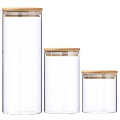 China Airtight Kitchen Stored Food Glass Wooden Lids Tank Covered Canister Sealed Organizer Storage Jar for sale