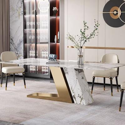 China 6 Seater Sintered Stone Italian Dining Table Furniture Designs With Carbon Steel Legs Dining Table for sale