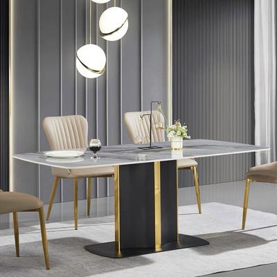 China Stone Sintered Stone Table Top With Matt Gold Stainless Steel Frame Dining Table for sale