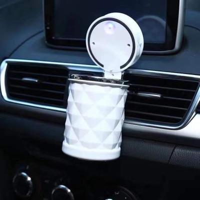 China Creative Plastic Car LED Portable Auto Ashtray Car Outlet Smokeless Ashtray for sale