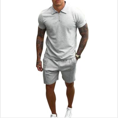 China Summer Athletic Men's Leisure Sports Suits Harajuku Japanese Brand Loose Short Sleeve Lapel T-shirt Tops Capri Pants Men for sale